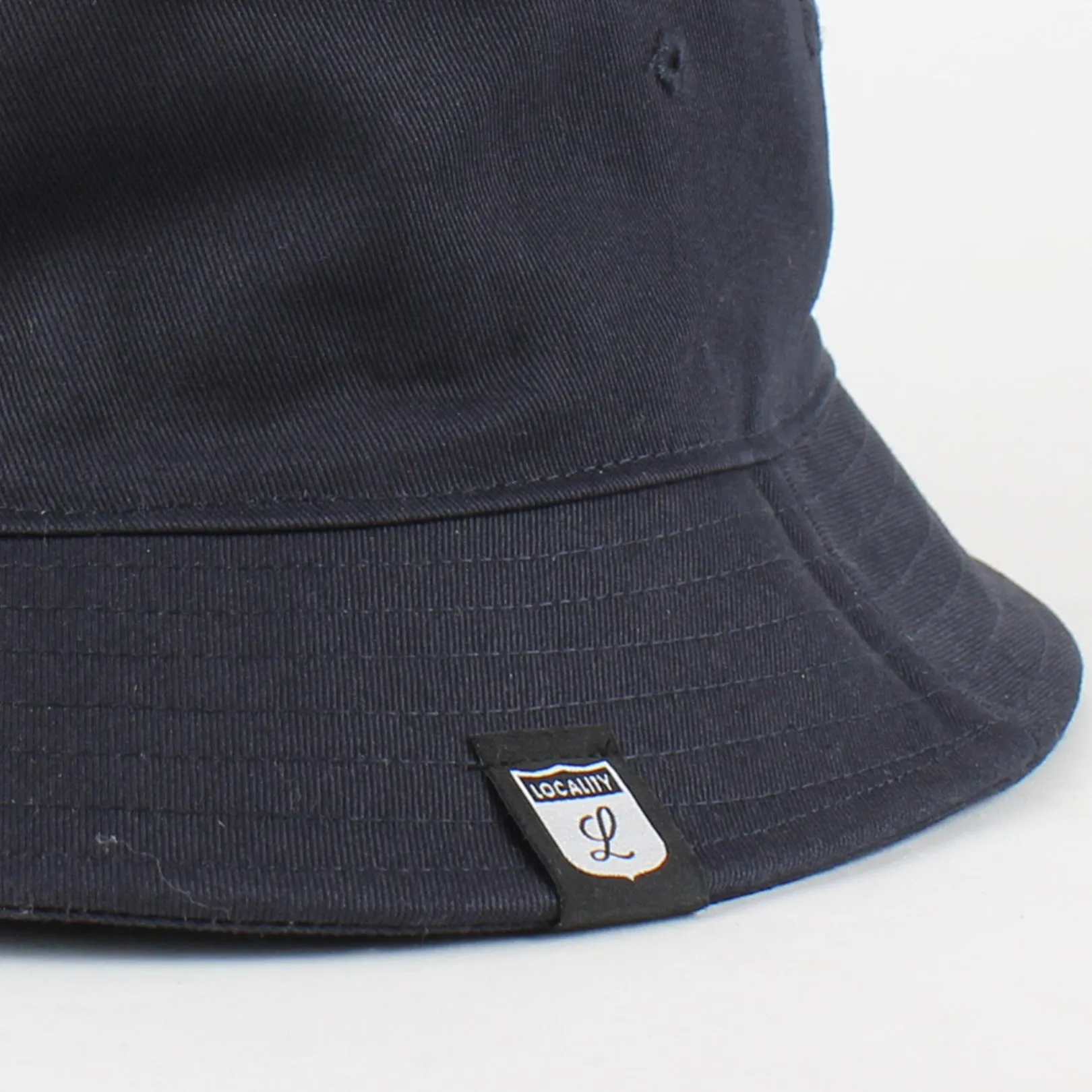 Locality Shield Bucket Hat Navy